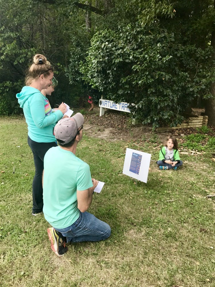 Members of the Auburn-Opelika community take part in the Active Auburn scavenger hunt on Sunday, Sept. 10, 2017, in Auburn, Ala.