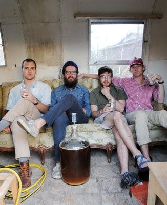 Wherry,  Yarbrough, Ballew and Knight sit in a Airstream trailer behind Ballew's home. (Maria  Iampietro / Associate Photo Editor )