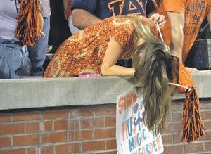 Fans hang their heads as Auburn looks up from the bottom of the SEC standings two years removed from winning a national championship. (Rebecca Croomes / PHOTO EDITOR)