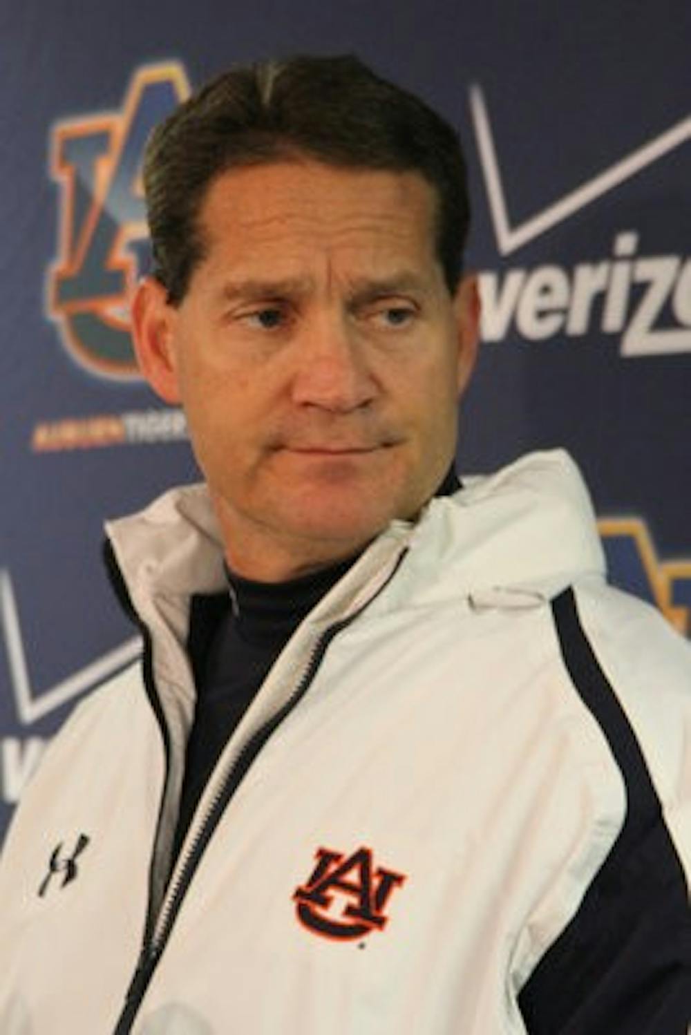 Gene Chizik addresses the media Saturday, Nov. 24 after Auburn's 49-0 Iron Bowl loss in Tuscaloosa. (Katherine McCahey / Photographer)