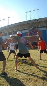 (From left to right) Jordan French and John McNiell take on Will Ibsen and Drew Rolader as the teams prepare for the Beat Bama Food Drive Spikeball tournament. (Andrew Yawn / SPORTS EDITOR)