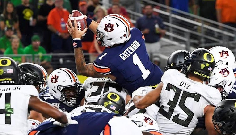 <p>Joey Gatewood (1) leaps for a touchdown during Auburn vs. Oregon on Aug. 31, 2019, in Arlington, Texas.</p>