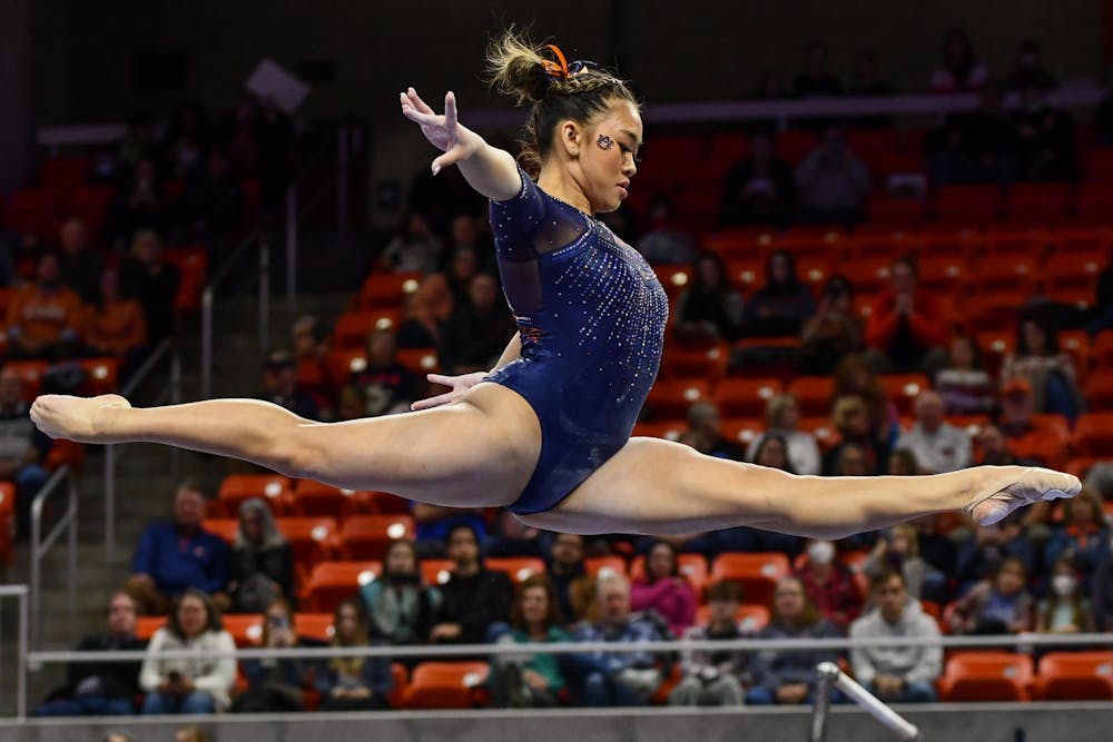 Auburn gymnast Sunisa Lee performs a beam routine during the gymnastics preview meet in Neville Arena on Dec. 16, 2022.