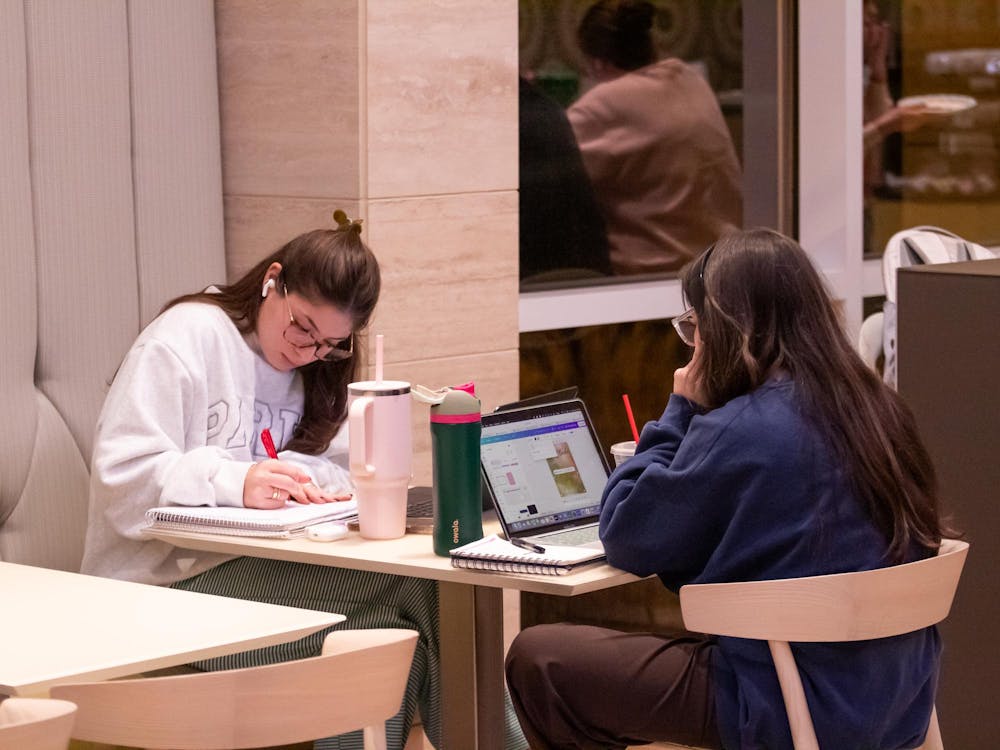 <p>Two students study during the study day event held at The Jule Collins Smith Museum of Fine Arts in Auburn, Ala. on Dec. 6, 2025.</p>
