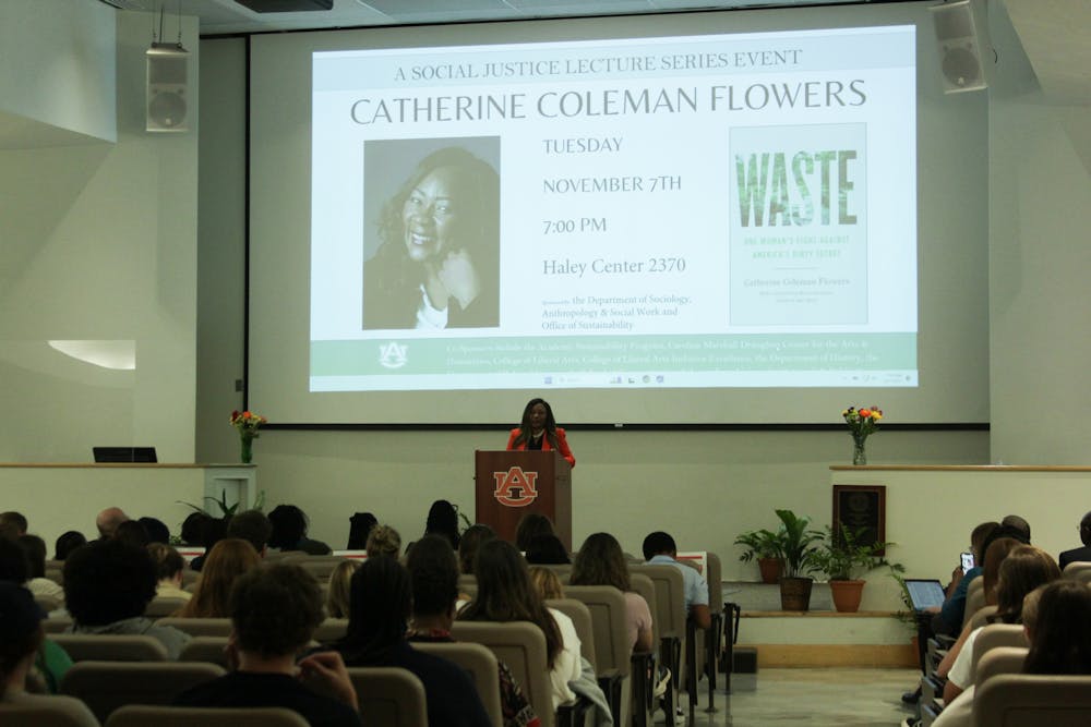 Students and community listening to Catherine Coleman Flowers' lecture on her book "Waste".