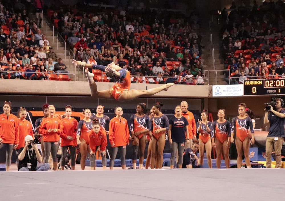 <p>Abby Milliet performing on the floor during Auburn gymnastics vs. Arkansas on Feb. 15, 2019, in Auburn, Ala.&nbsp;</p>