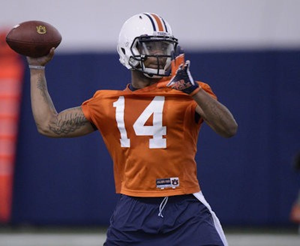 Quarterback Nick Marshall throws during Auburn's first week of spring practice. (Contributed by Lauren Barnard)