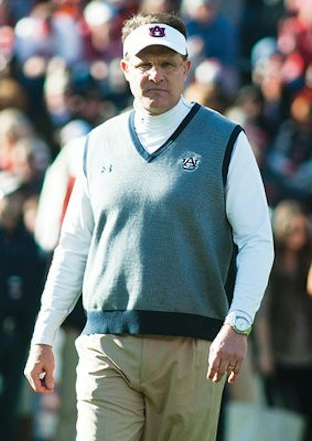 Auburn head coach Gus Malzahn walks on the field before the 2013 Iron Bowl. (Contributed by Zach Bland)