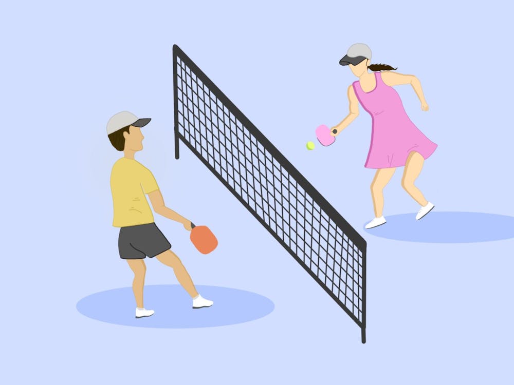 A boy in a yellow shirt and a girl in a pink dress play pickleball across a black net on a light blue background.