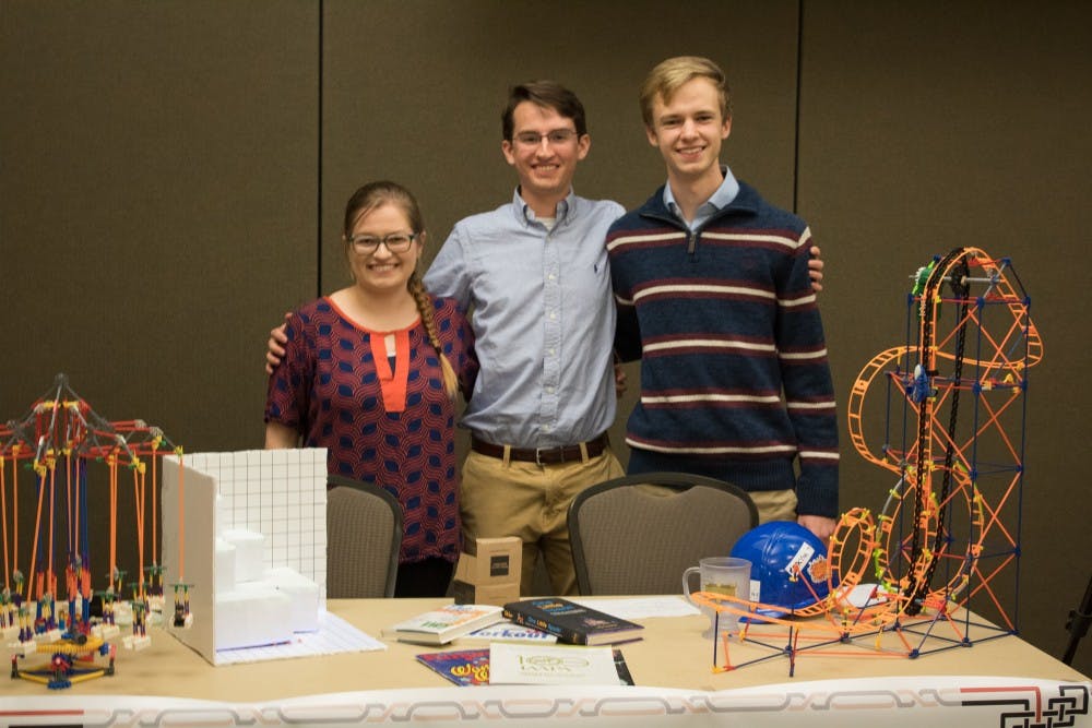 <p>Katie Bowman, Seth Harris, and Gavin Prather represent&nbsp;the Theme Park Engineering Group&nbsp;at the Organization Showcase in the Student Center Ballroom on Tuesday, March 20, 2018 in Auburn, Ala.&nbsp;</p>