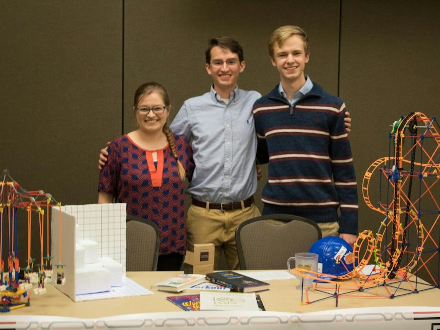 Katie Bowman, Seth Harris, and Gavin Prather represent&nbsp;the Theme Park Engineering Group&nbsp;at the Organization Showcase in the Student Center Ballroom on Tuesday, March 20, 2018 in Auburn, Ala.&nbsp;