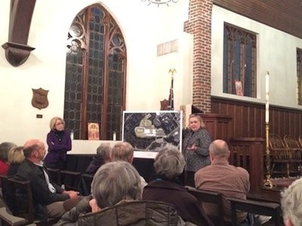 Councilwoman Lynda Tremaine (left) and Dr. Karen DeLano (right) speaking to Ward 5 residents about a proposed layout of a new Auburn High School. (Pierce Ostwalt | Community Writer)