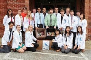 Auburn Police and the Auburn University chapters of the National Community Pharmacists Association and Kappa Psi, a pharmacy fraternity, collected prescription medication from people looking to dispose of it in an effort to prevent crimes related to prescription drugs. (Rebecca Croomes / PHOTO EDITOR)