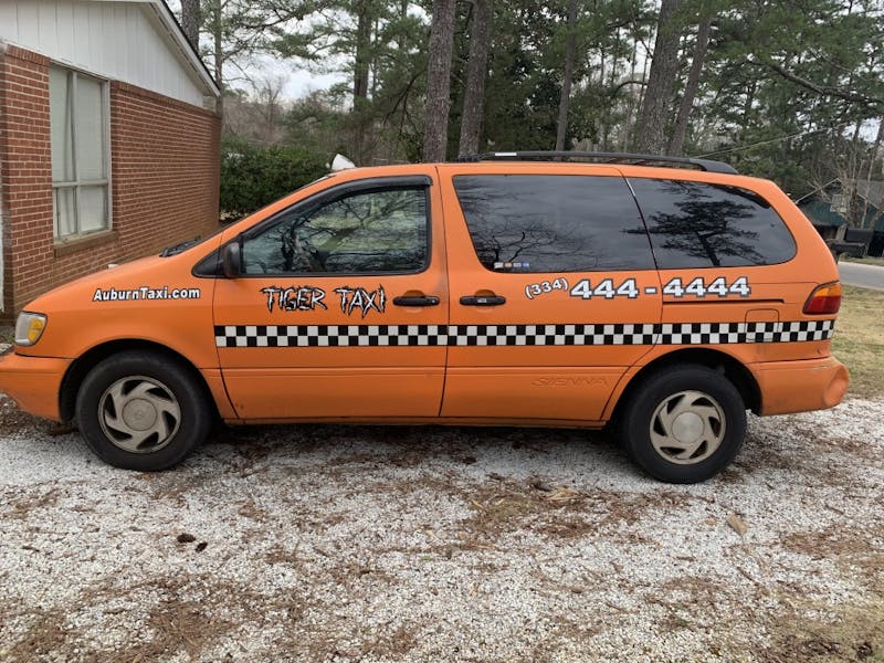 A Tiger Taxi vehicle sits on standby in Auburn, Ala. on February 14, 2019