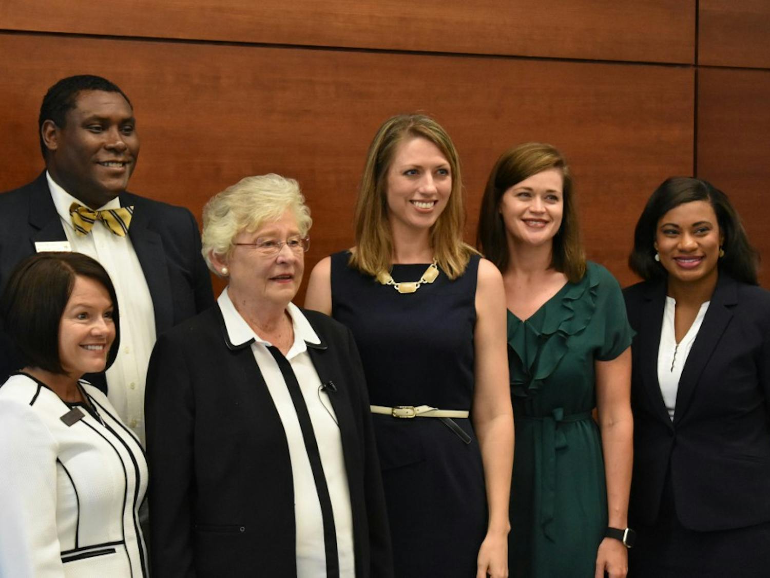 Gov. Kay Ivey with members of Auburn High School's administration on July 25, 2017 in Auburn, Ala.