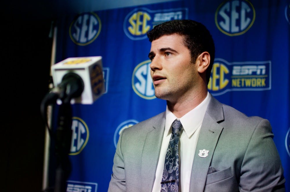 <p>Jarrett Stidham answers a question during an interview at SEC Media Days in the College Football Hall of Fame on Thursday, July 19, 2018 in Atlanta, Ga.</p>