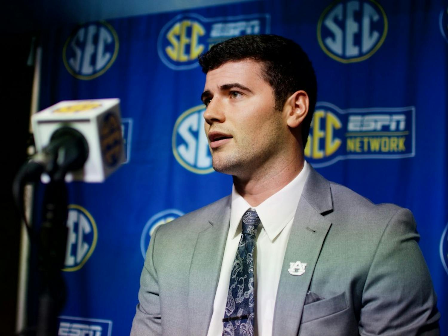 Jarrett Stidham answers a question during an interview at SEC Media Days in the College Football Hall of Fame on Thursday, July 19, 2018 in Atlanta, Ga.