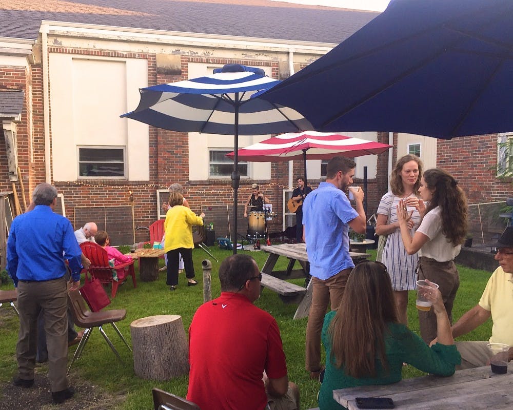 Members of the Auburn-Opelika community gather at the Southside Center for the Arts for the Supper & Songs event&nbsp;on Sunday, Aug. 20, 2017,&nbsp;in Opelika, Ala.&nbsp;