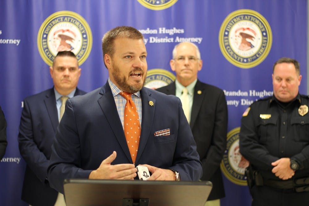 <p>District Attorney Brandon Hughes at a press conference on Tuesday, Nov. 14th.&nbsp; He is joined by Sheriff Jay Jones, John McEachern, Will Matthews and Barry Matson.&nbsp;</p>