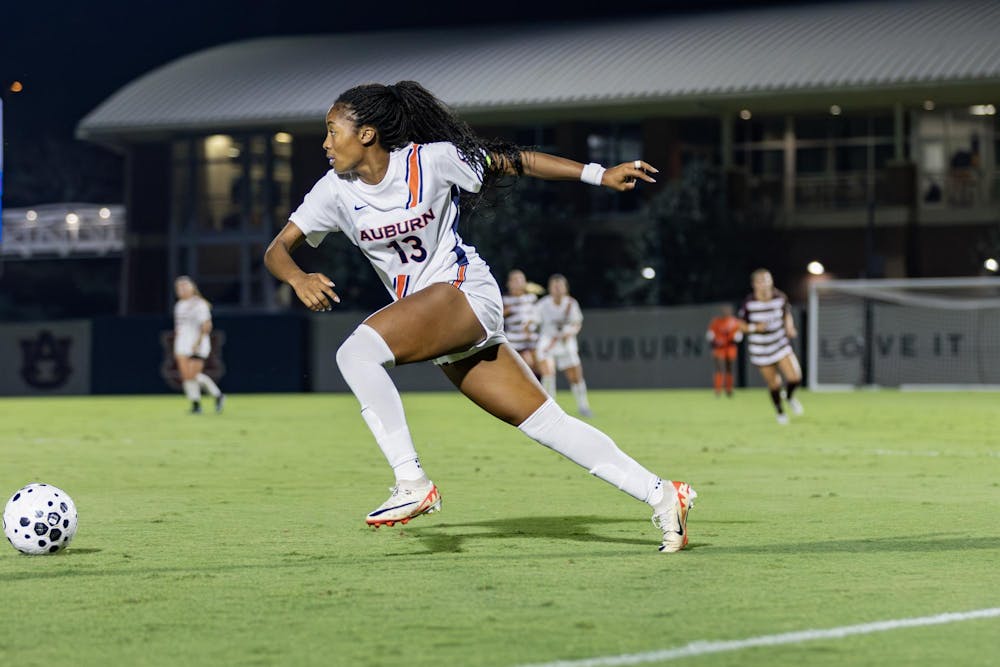 Asha Means (#13) makes a play on the ball during the soccer game versus Texas A&M at the Auburn Soccer Complex on Sept. 18, 2025.