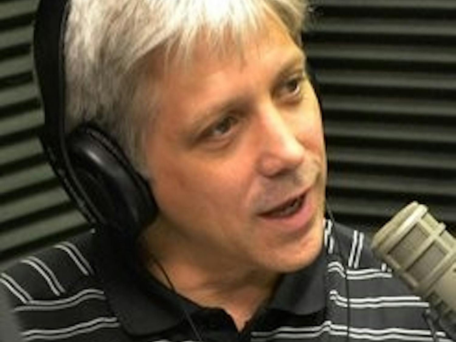 Ron Anders (bottom) and Rich Perkins (top) are the hosts of The Drive weekdays from 4-6 p.m. on ESPN Radio 106.5 FM. (Danielle Lowe / PHOTO EDITOR)