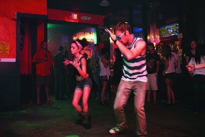 Dancers move to the dubstep beats of DJ Esco at the monthly TKO dance party,  now held at Bourbon Street Bar after the closing of The Independent. (Rebecca Croomes / ASSISTANT PHOTO EDITOR)
