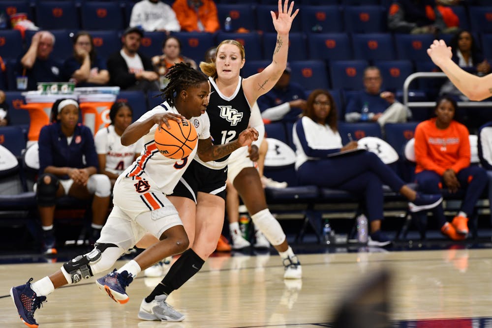 <p>Jakayla Johnson (#3) is dribbling against UCF at the Neville Arena on Dec. 3, 2022.&nbsp;</p>