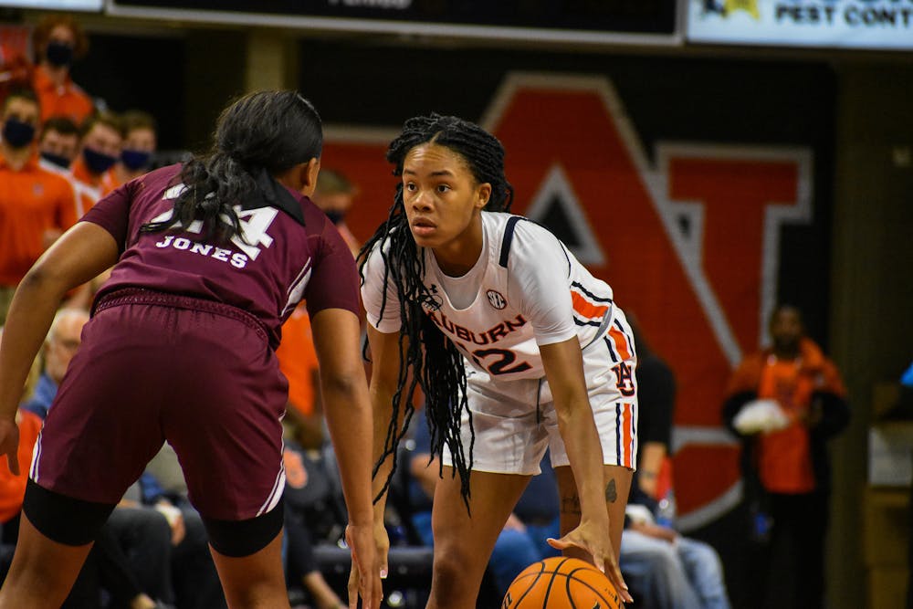 February 3, 2022; Auburn, Alabama; Mar'shaun Bostic (12) controls the offense from the point in a match between Auburn and Mississippi State in the Auburn Arena.
