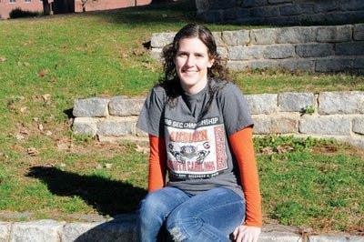 Sarah Evander, freshman in anthropology and Spanish, relaxes on the rocks of the AU amphitheater. (Christen Harned / Assistant Photography Editor)