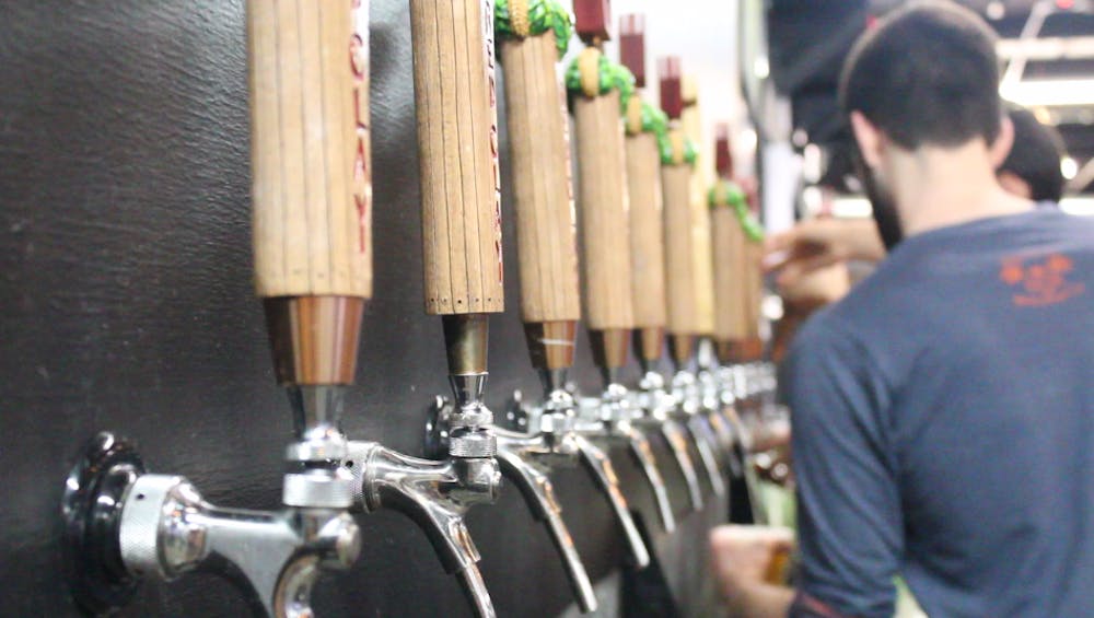 <p>The beer taps at Red Clay Brewery on Friday, April 6, 2018, in Auburn, Ala.</p>