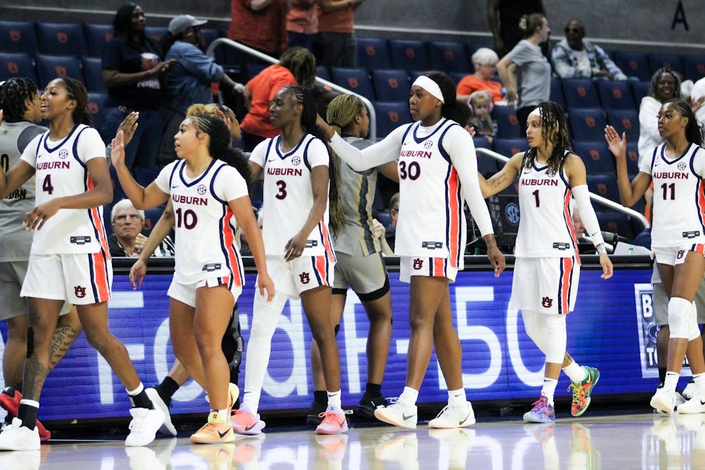 <p>The Auburn Women's Basketball team high fives Alabama state after Auburn wins the game at Neville Arena in Auburn, Ala. on Nov. 8, 2025.</p>