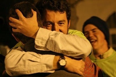 Owen Parrish embraces Treasurer-elect Richard Pettey after hearing the results of Tuesday night's SGA elections. Parrish received 3,621 of the 7,470 votes cast. (Rebecca Croomes / PHOTO EDITOR)