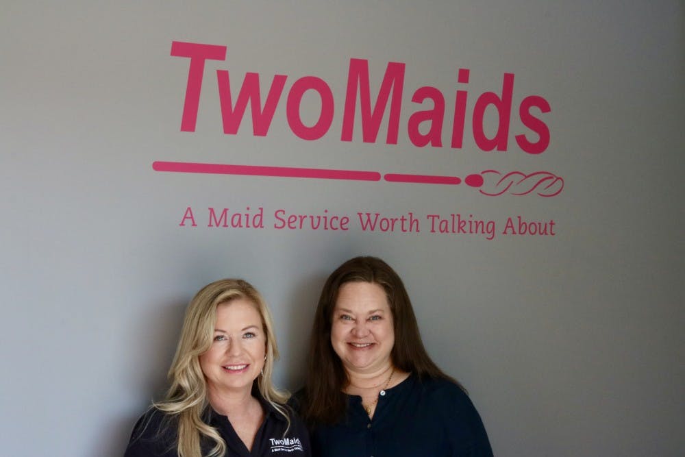 Nicole Akers and Chrissy of Two Maids cleaning offer free cleaning services to Breast Cancer victims on Friday, Oct. 4, 2019, in Auburn, Ala.  