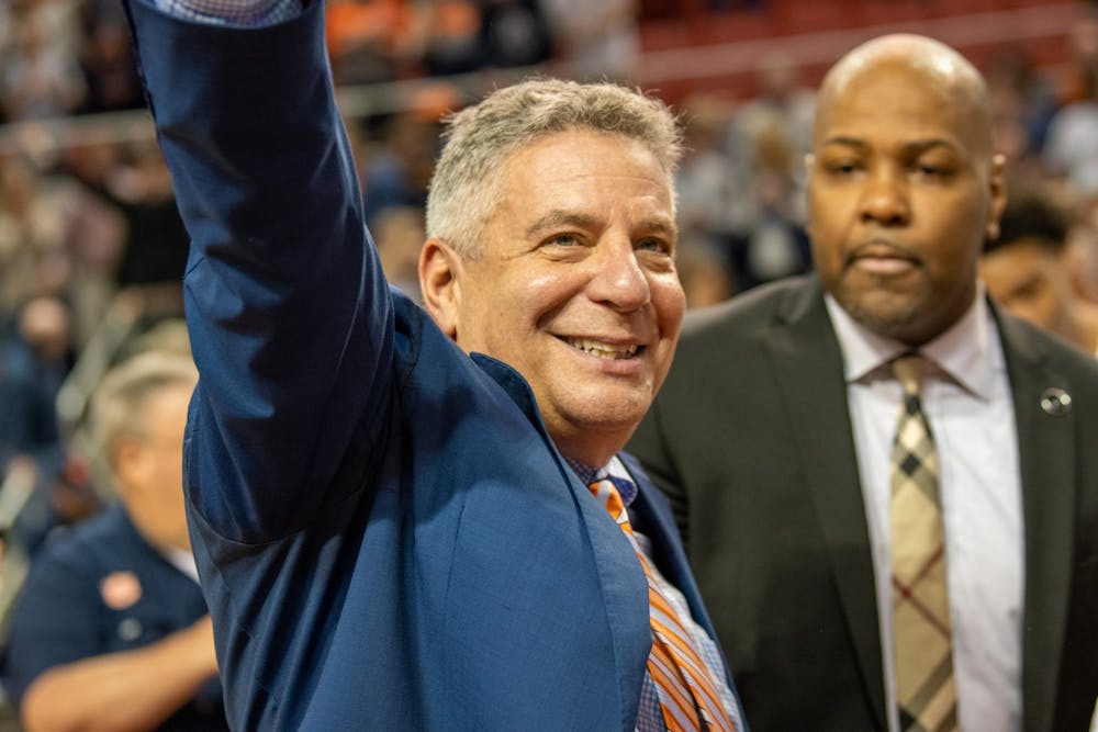 Coach Bruce Pearl waves to the student section during Auburn Men's Basketball vs LSU, on Saturday, Feb. 8, 2020, in Auburn, Ala. 