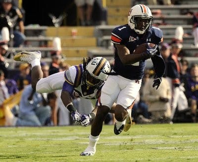 Freshman wide receiver Trovon Reed escapes LSU's defense in the first half of Saturday's game. (Todd Van Emst)