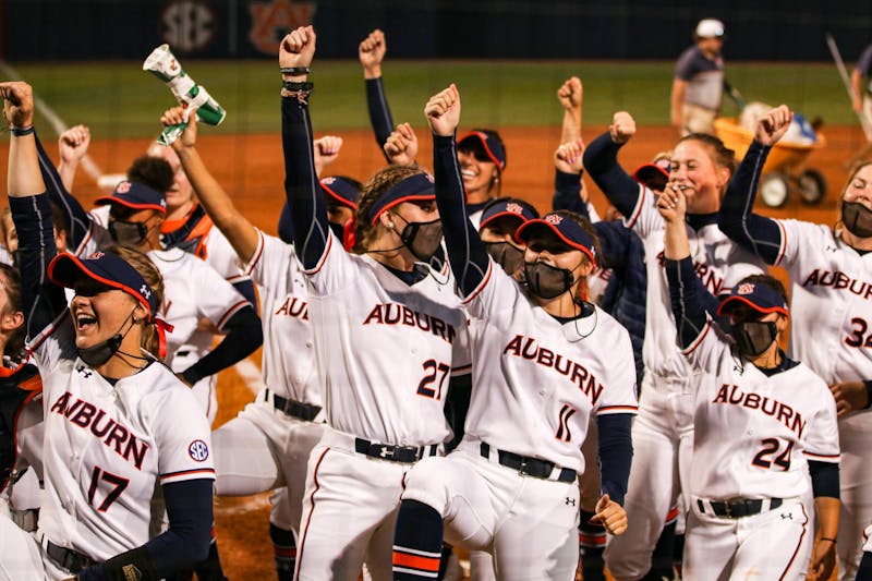 The team reacts after a win during the game between Auburn and Kentucky at Jane B. Moore Field on April 16, 2021; Auburn, AL, USA. Photo via: Jacob Taylor/AU Athletics
