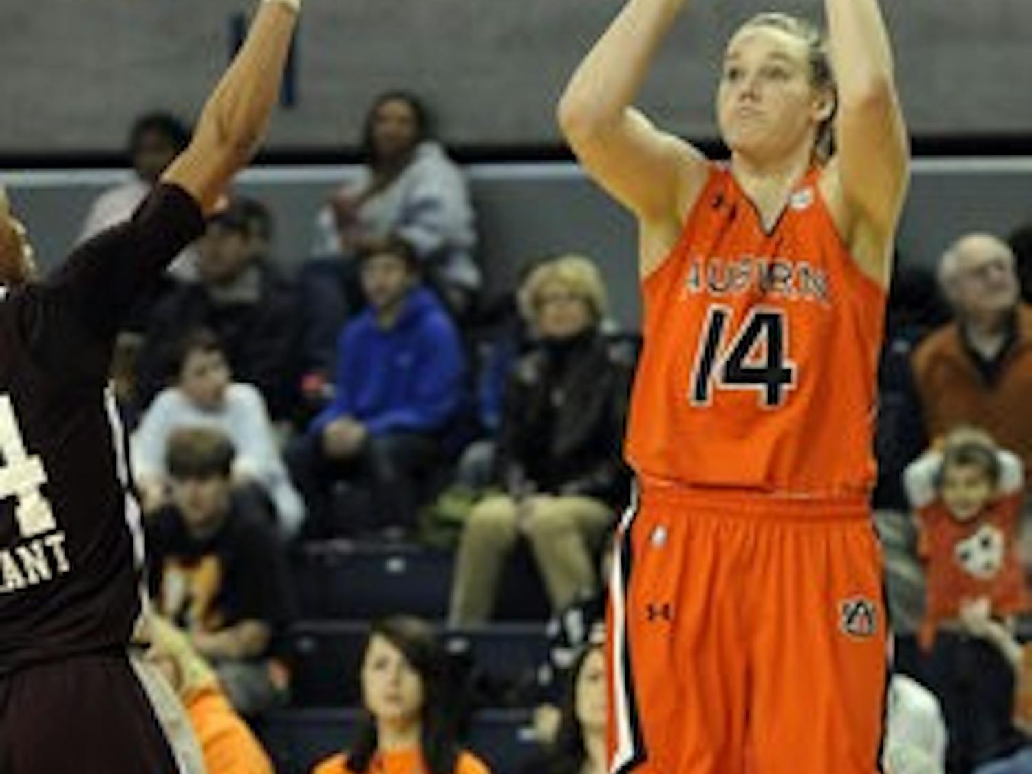 Auburn's Blanche Alverson shoots from the outside over Mississippi State's Kendra Grant during the first half. (Courtesy of AUBURN ATHLETICS)