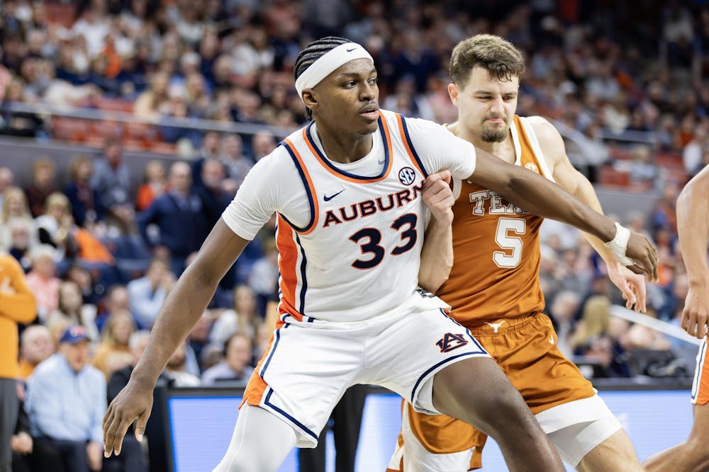 <p>Sebastian Williams-Adams (#33) defends a Texas player during the basketball game in Neville Arena on January 28 2026.</p>