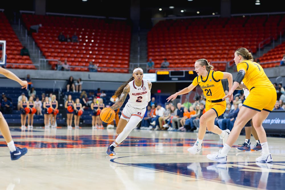 Auburn guard JaMya Mingo-Young drives down the court against California on November 17, 2023 in Neville Arena. 