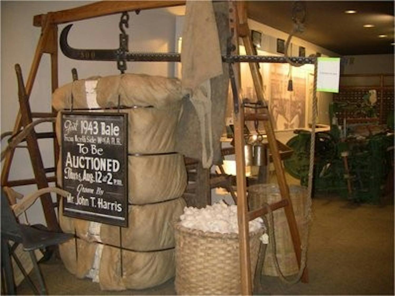 500 lb. bale of cotton and scale formerly owned by John T. Harris, one of the founders of the museum. (Nathan Simone / ONLINE EDITOR)