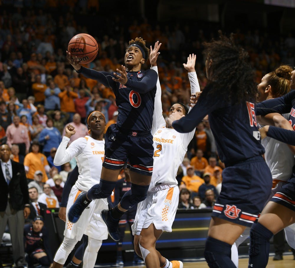 Auburn's Daisa Alexander lays in a basket to tie Tennessee with 11 seconds left to play. Tennessee's Rennis Davis hit a 3-pointer with .5 seconds left to win.Auburn vs TennesseeSEC Women's Basketball Tournament on Thursday, March 1, 2018 in Nashville, TN. Todd Van Emst/SEC