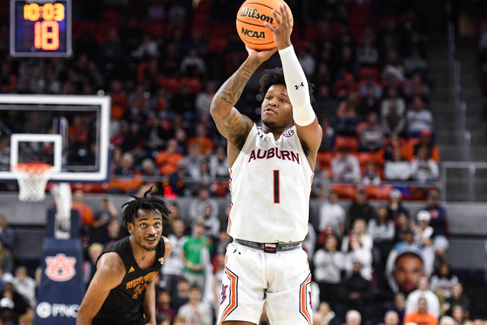 <p>Auburn guard Wendell Green Jr. (1) shoots a jumpshot against the Winthrop Eagles in Neville Arena on Nov. 15, 2022.</p>