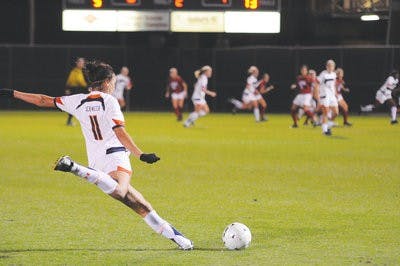 Sophomore defender Christine Schweer, prepares to pass the ball downfield against Alabama Friday. (Christen Harned / Assistant Photo Editor)