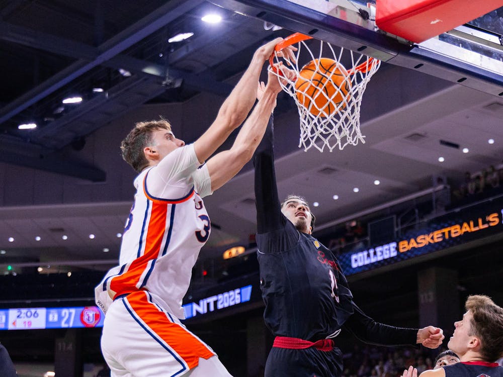 <p>Filip Jovic dunks over a defender against Seattle on March. 22, 2026.</p>