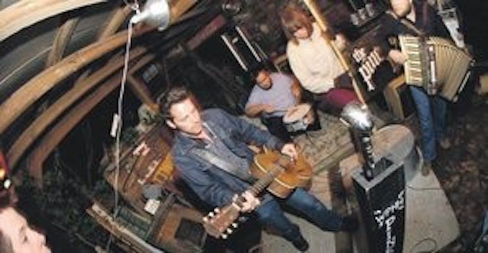 The Pine Hill Haints played in 2005 at Standard Deluxe with Brian Conner on bucket, Mike Posey on accordion, Jeremy Henderson on snare, Kat Barrier on washboard and mandolin and Jamie Barrier on lead guitar. (Courtesy of Jeremy Henderson)