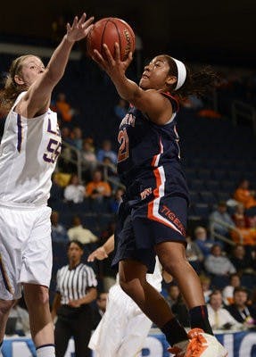 Auburn's Chadarryl Clay shoots around LSU's Theresa Plaisance Thursday, March 7 at the SEC Tournament. (Courtesy of Todd Van Emst)