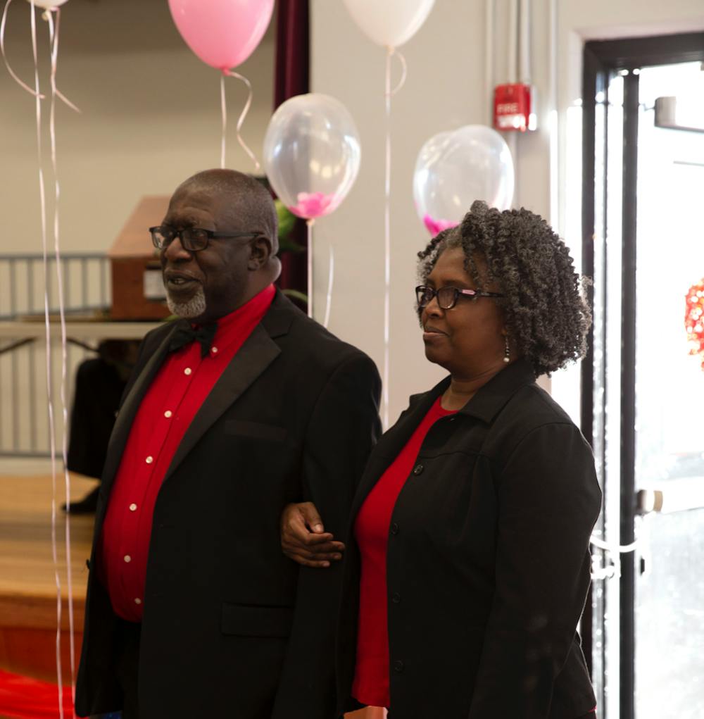 <p>A couple enters the Boykin Community Center during the Senior Citizen Valentine Ball that was held on Feb. 15, 2020.</p>