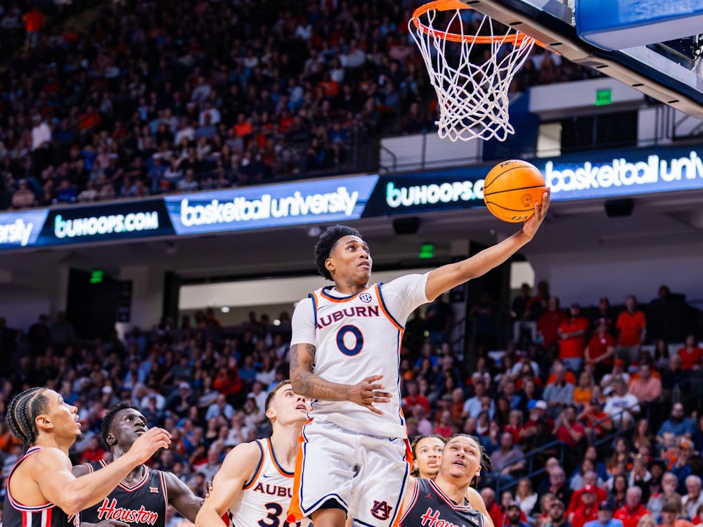 Tahaad Pettiford rises up for a layup under the basket against Houston on Nov. 16, 2025.