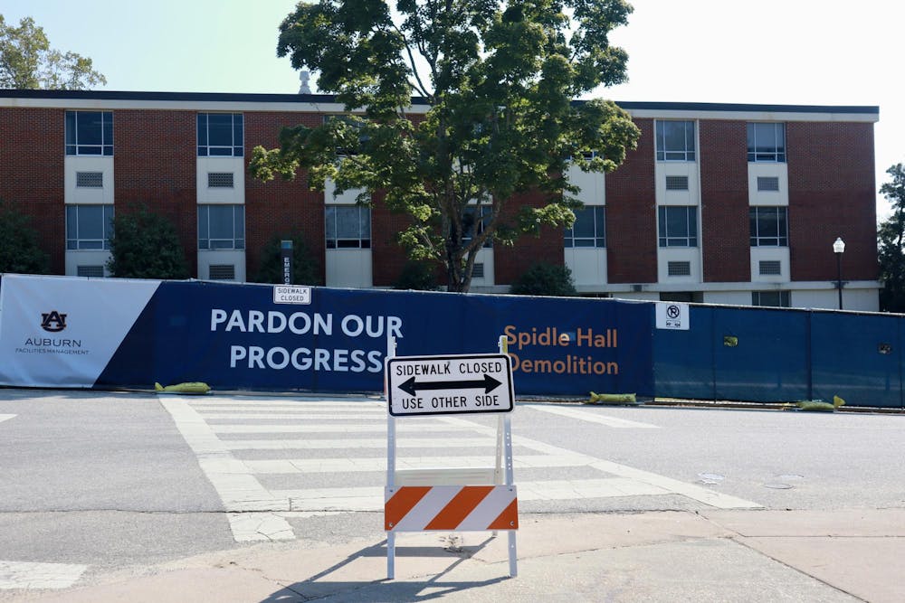A construction sign blocks the crosswalk outside of the Spidle Hall demolition site on Wednesday, Sep. 17, 2025.