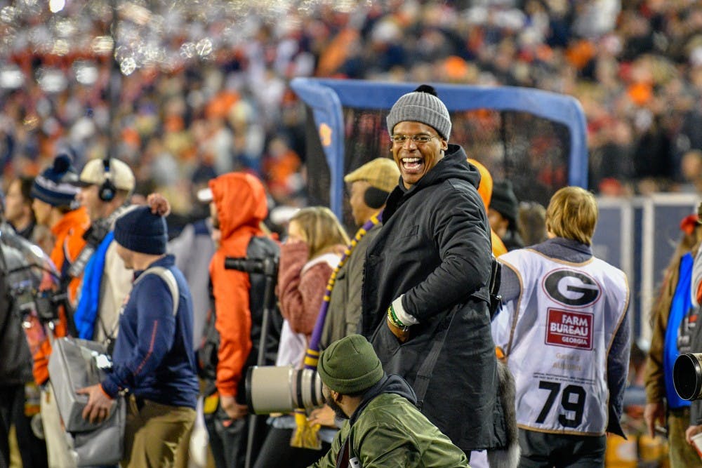 Cam Newton laughs on the sideline during Auburn Football vs. Georgia on Saturday, Nov. 10, 2018, in Athens, Ga.